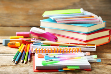 Fototapeta premium Bright school stationery on old wooden table