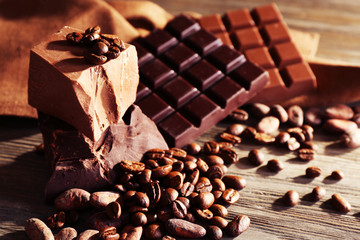 Still life with set of chocolate with coffee grains, closeup