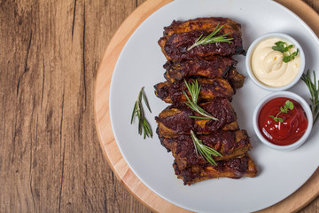 Grilled pork ribs in barbecue sauce