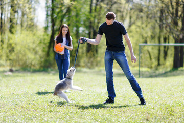 Happy young couple and  dog