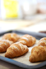 Baking croissant cookies.