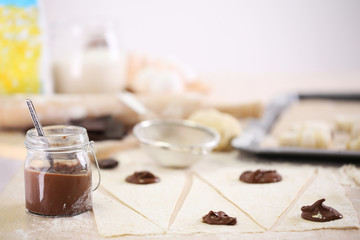 Making croissant cookies.