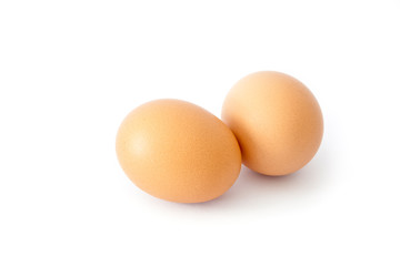 brown chicken egg isolated on white.