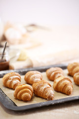 Baking croissant cookies.