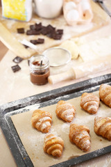 Baking croissant cookies.