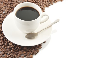 Line made of coffee beans with cup of coffee