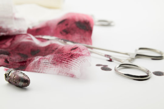 Composition with bullet, blood and bandage