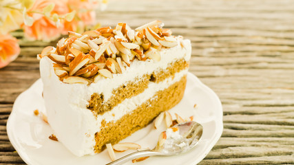 Almonds cake on wooden in the vintage style