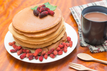 Delicious pancakes with fresh mulberry