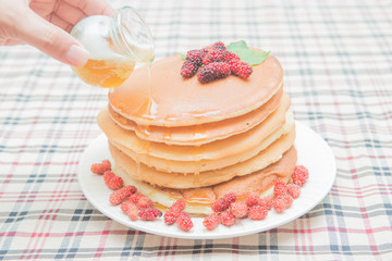 Delicious pancakes with fresh mulberry and honey