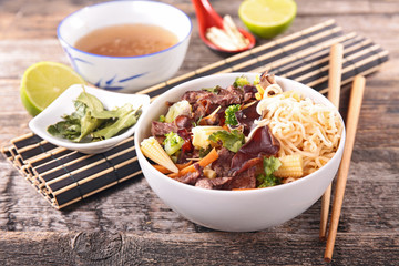 chinese soup with noodles,vegetable and beef