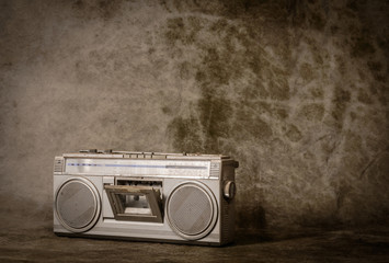 the still life retro radio on grunge background