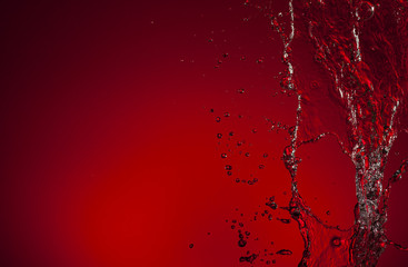 Texture of water on red background