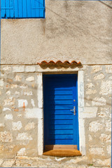 Fototapeta premium The wall and the window, mediterranian architecture. Rovinj, Cro