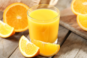 Fototapeta na wymiar Orange juice on table close-up