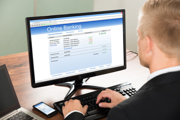 Businessman Using Online Banking Service