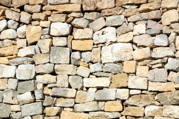 Fototapeta premium Mur construit à pierres sèches