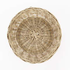Brown wicker basket on white background, top view