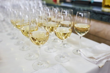 glasses with Champagne on white table