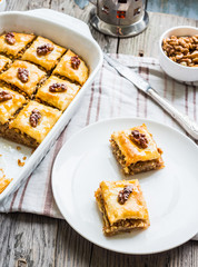 pieces of baklava with honey and nuts, rustic,  Turkish dessert