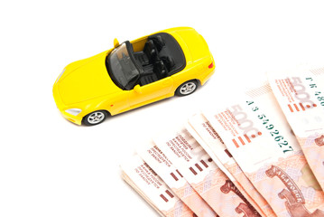 yellow car and banknotes