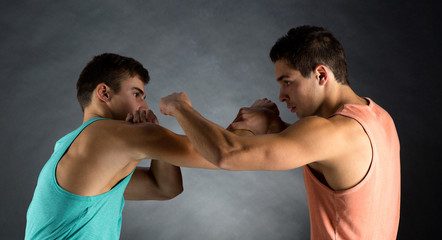 Fototapeta na wymiar young men wrestling