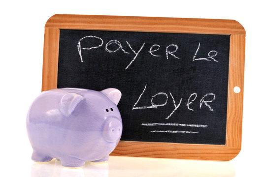 Rappel &eacute;crit sur une ardoise pour payer le loyer