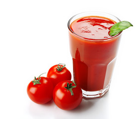 Glass of fresh tomato juice isolated on white