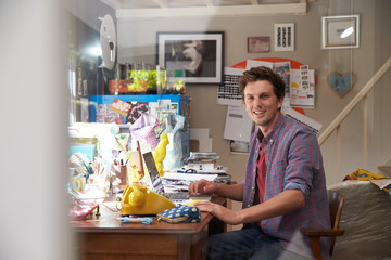 Man On Laptop Running Business From Home Office