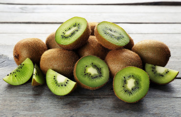 Ripe kiwi on wooden table close-up