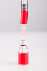 Medical vials for injection with a syringe