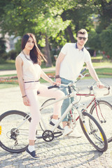 Fototapeta premium Young couple have bike riding