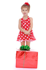  Cute little girl in a red polka-do