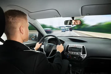 Photo sur Plexiglas Voitures rapides Businessman Driving Car