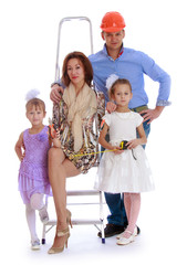  young family makes repairs in the apartment 