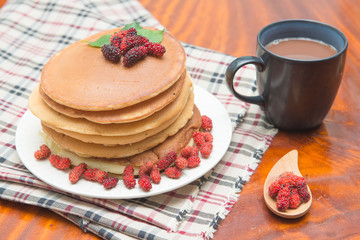Delicious pancakes with fresh mulberry