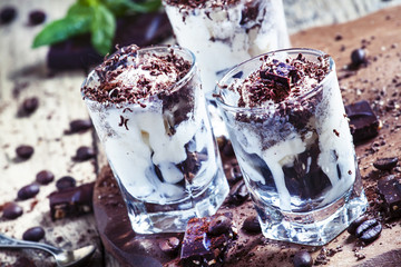Dessert of dark chocolate, coffee and ice cream in small glasses