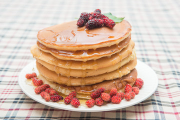 Delicious pancakes with fresh mulberry and honey