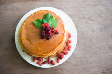 Delicious pancakes with fresh mulberry and honey
