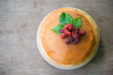 Delicious pancakes with fresh mulberry and honey