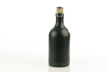 ceramic bottle with cork.