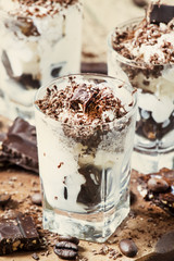 Dessert of dark chocolate, coffee and ice cream in small glasses