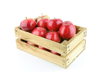 Red Elstar apples in a wooden crate.