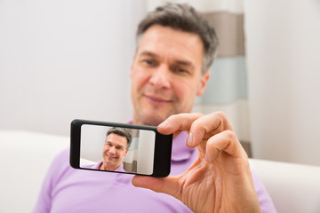 Man Taking Self Portrait
