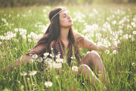 Beautiful hippie woman enjoying sun
