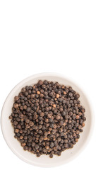 Black pepper in white bowl over white background
