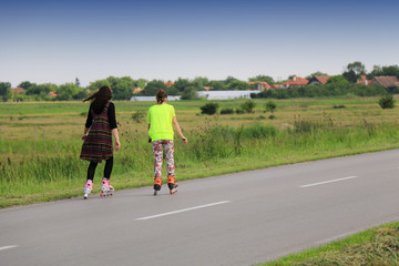 women on rollerblades