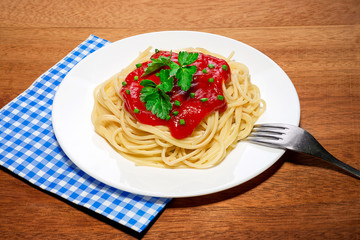 Spaghetti with tomato sauce and herbs