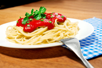 Spaghetti with tomato sauce and herbs