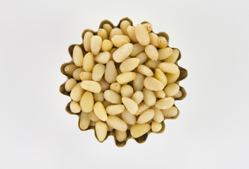 Handful of pine nuts in figured form